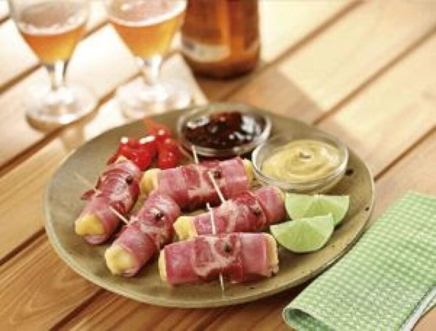 Enroladinho de presunto e lombo é um petisco fácil, assado no forno e cheio de sabor