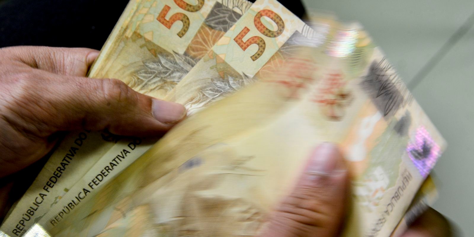 Caixa começa a pagar Bolsa Família de maio