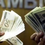 Dólar cai e fecha abaixo de R$ 5, após recuo de Trump no Irã