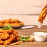 Imagem de uma porção de frango frito empanado
